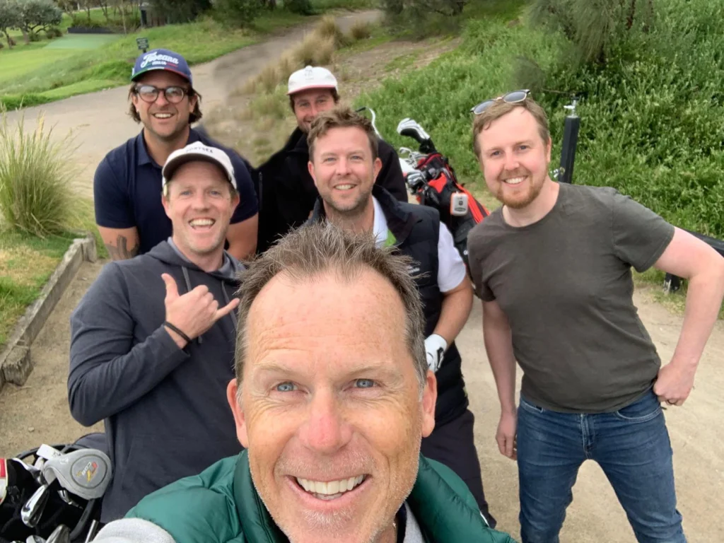 Conrad with the team of business owners